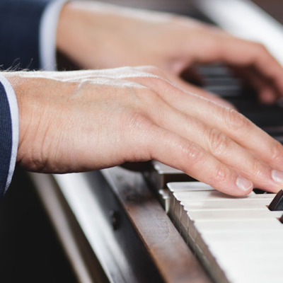 Mark Hoeppner Pianist with his hands on piano